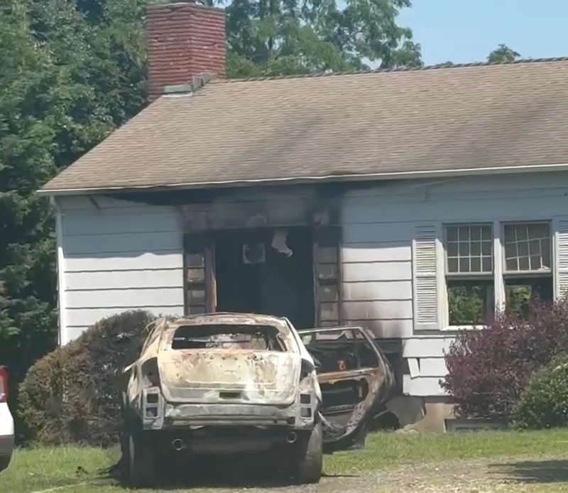 The driver plowed into the historic Quaker Meeting House early Thursday morning and died in the fiery crash