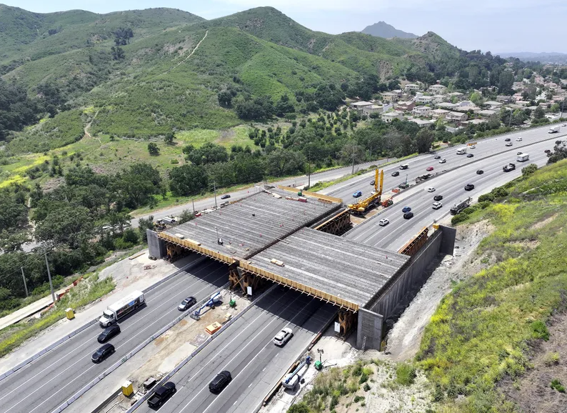 An aerial view of construction of the Wallis Annenberg Wildlife Crossing over the 101 Freeway on May 13, 2024 in Agoura Hills, California.