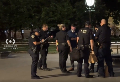 Police investigate a stabbing at Washington Square Park.