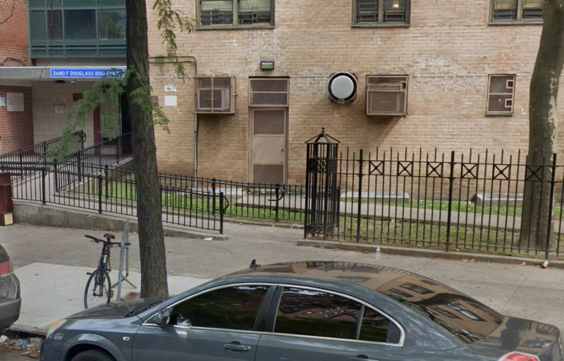 A man and bystander were shot at a Harlem NYCHA complex on Monday afternoon.