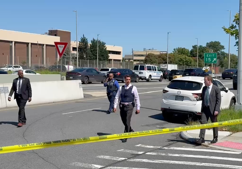 The detective was shot in the area of 22nd Road and the Whitestone Expressway service road