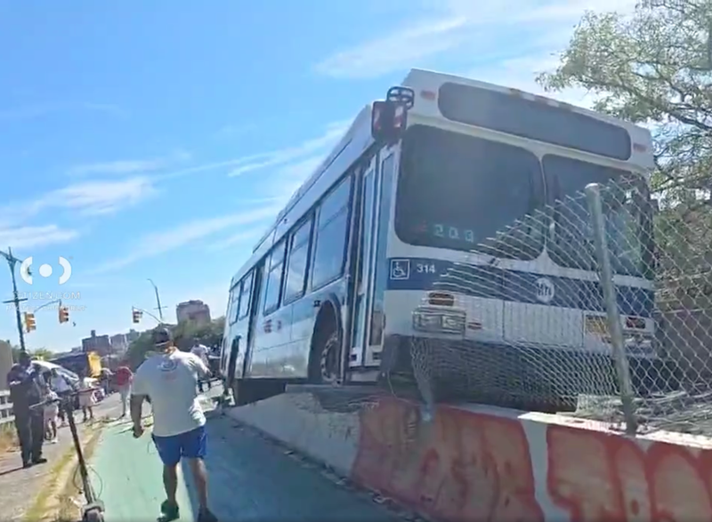 An MTA bus collided with a concrete barrier wall in the Bronx on Tuesday morning, causing four minor injuries.