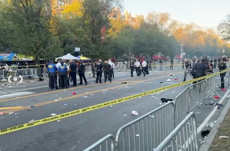 Police at the scene of a shooting on Eastern Parkway on Monday