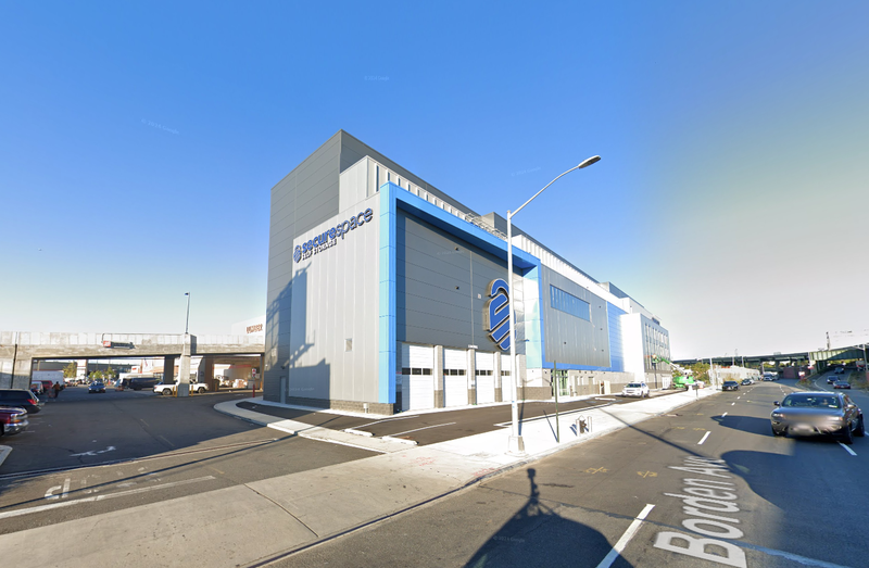 A man lying under a box truck was crushed to death in Queens on Thursday morning