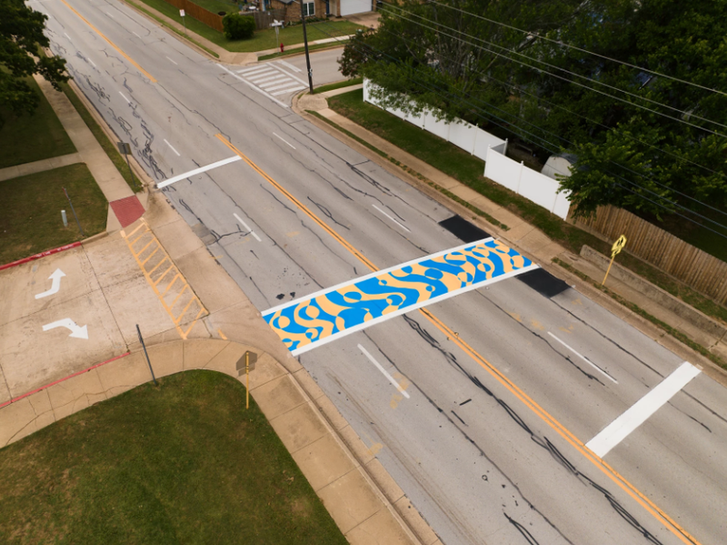 Two student-designed crosswalks in Bedford are being removed this month to comply with a new Texas policy banning non-standard street markings that don’t directly support traffic control or safety.