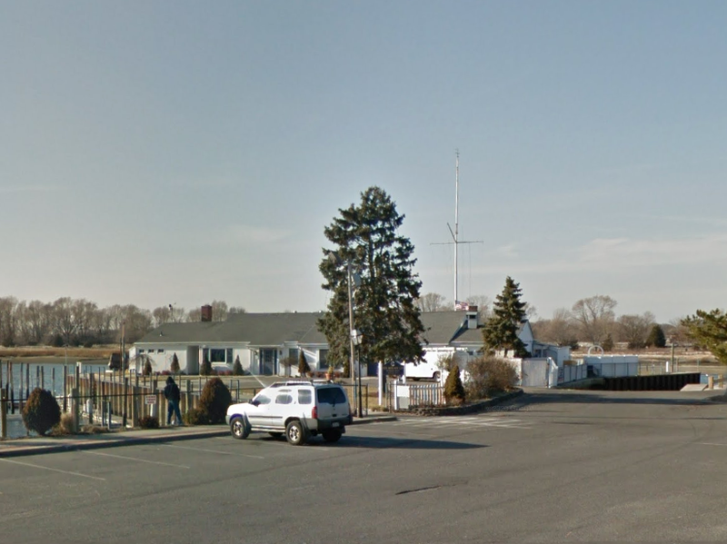 The victim was found fatally stabbed outside the Stony Brook Yacht Club on Shore Road