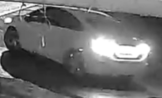 Surveillance photo of white sedan linked to deadly shooting of Hamid Boyd