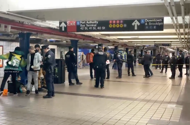 Two men were taken into custody after at least one gunshot was fired near the A/C/E lines of the 42nd Street station