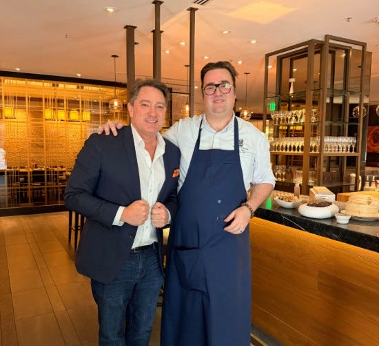 Liam Mayclem with George Vanyi from The Ritz-Carlton in San Francisco.