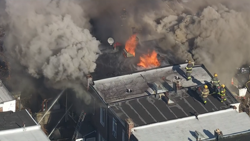 Firefighters battle house fire