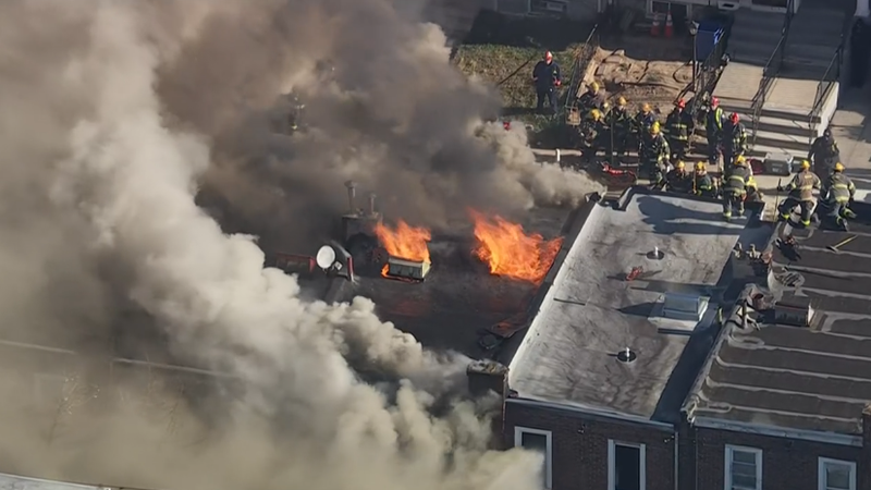 Firefighters battle house fire