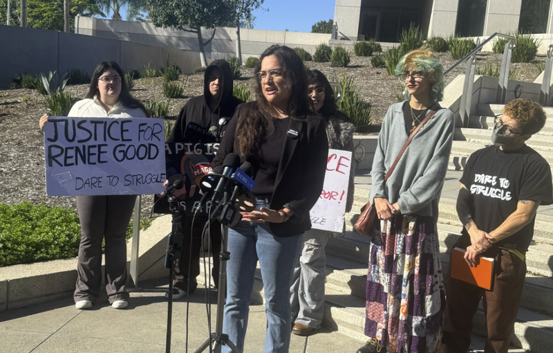 Members of Dare to Struggle group at Tuesday's press conference. K, who says he was blinded by a federal agent, was not at the press conference. Someone from the group read his statement. 