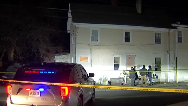 New Jersey State Police investigate a home in Millville, New Jersey, which they say was connected to a shooting Tuesday night.