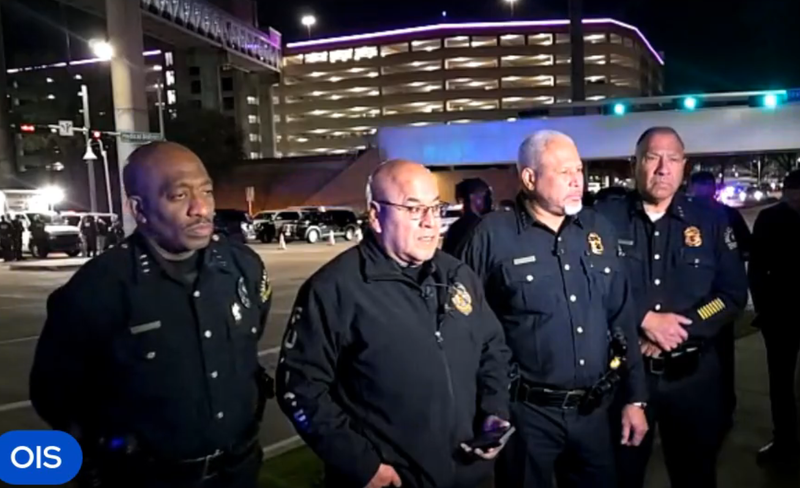 A man wanted on multiple felony warrants is dead after Dallas police officers shot him inside a parking garage at Children's Health Hospital late Wednesday night, following a tense barricade standoff that brought SWAT teams to the Medical District.