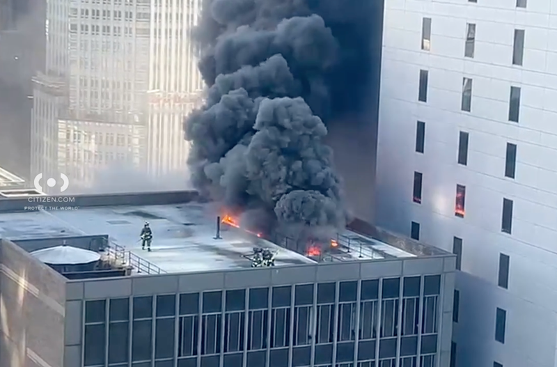Smoke was pouring out of the roof near the St. Patrick's Day Parade route