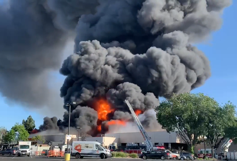 A South Bay man has been arrested for felony arson in connection with the massive fire that leveled a Home Depot in south San Jose, causing millions of dollars of damages.