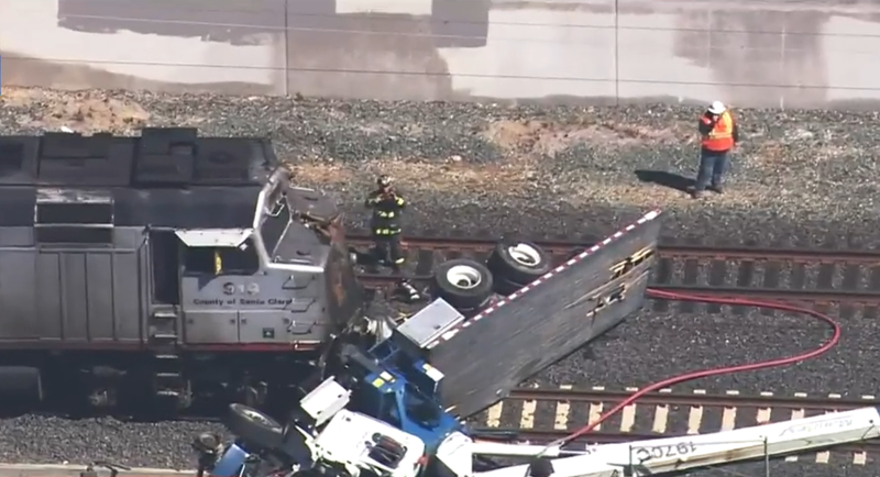 The engine of SB506 stopped with a utility truck in front of it.