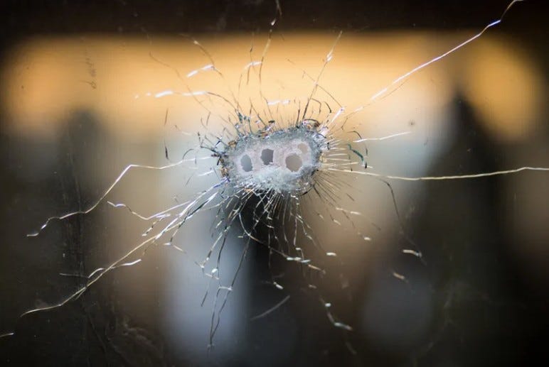 Bullet hole in glass