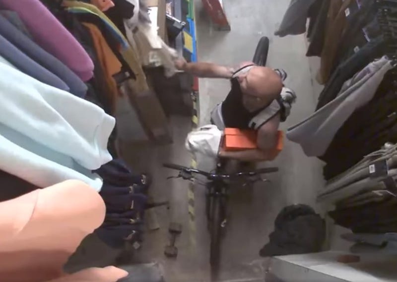 Suspect stealing clothes 