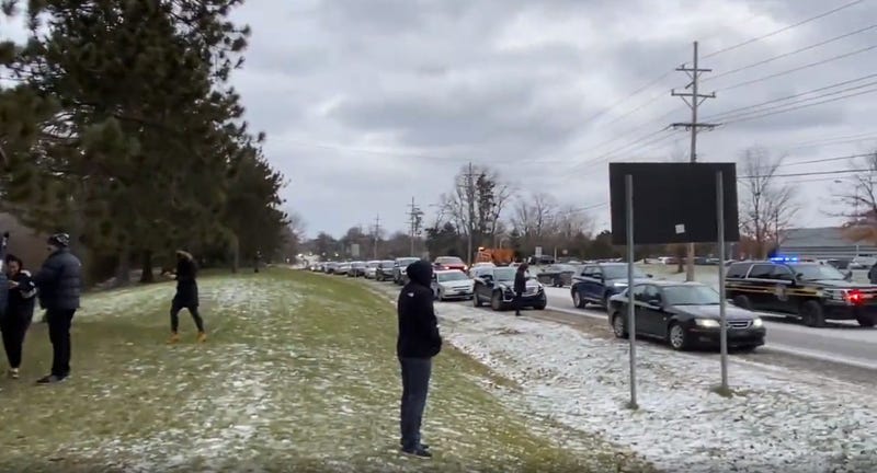 Parents waiting for children to be released from school's lockdown