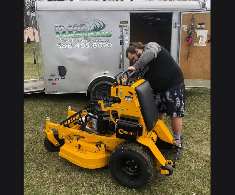 Man with lawn equipment
