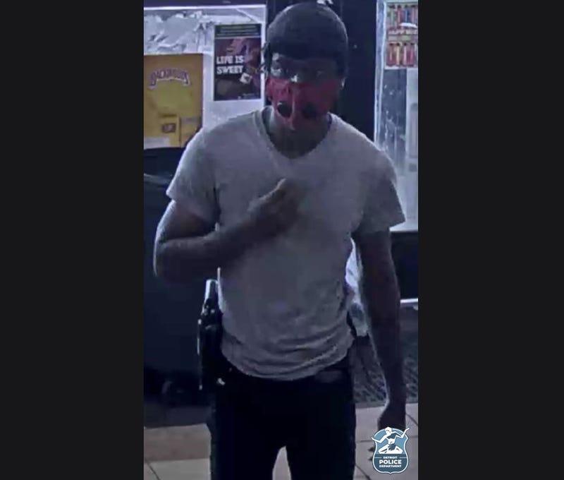 Suspect in mask