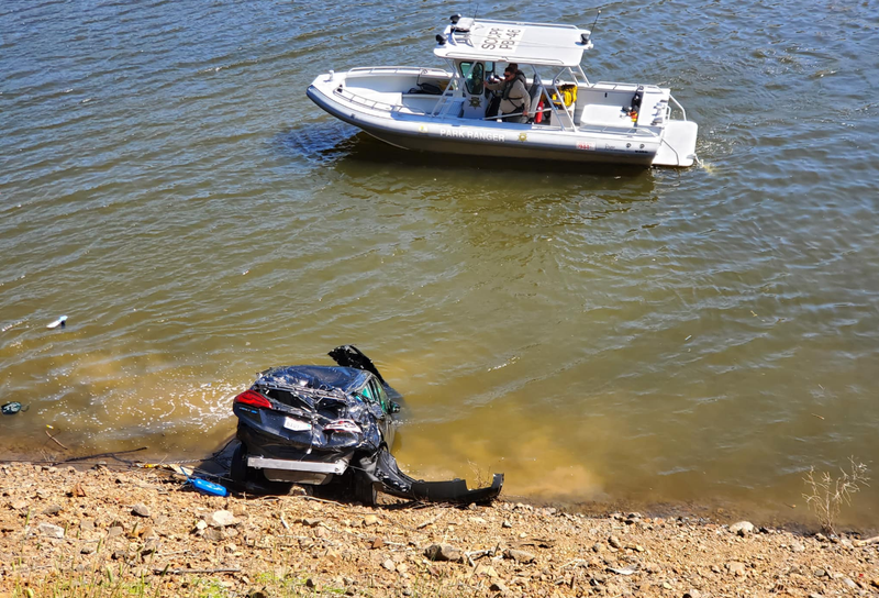 Patrol boat searches the water at the Uvas Reservoir in Morgan Hill on Tuesday. 
