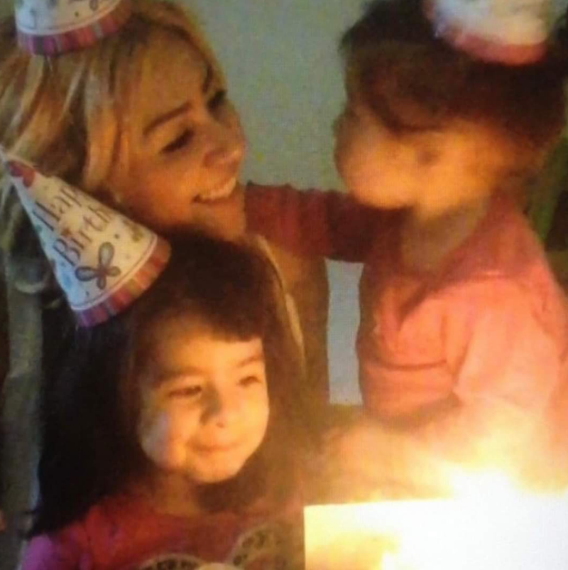Erica Chanon Pantoja, 29, in an undated photo with two of her six children.