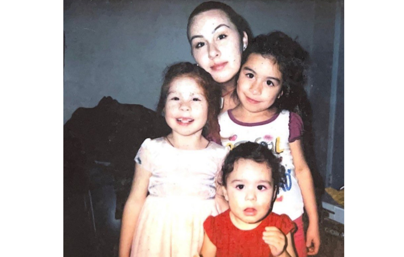 Erica Chanon Pantoja, 29, in an undated photo with three of her six children.