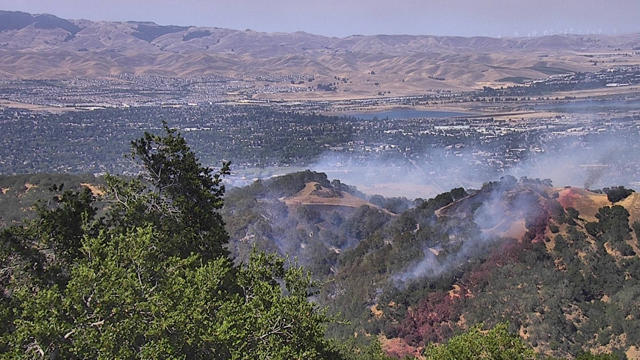 Firefighters battle brush fire near Pleasanton Ridge; evacuations lifted