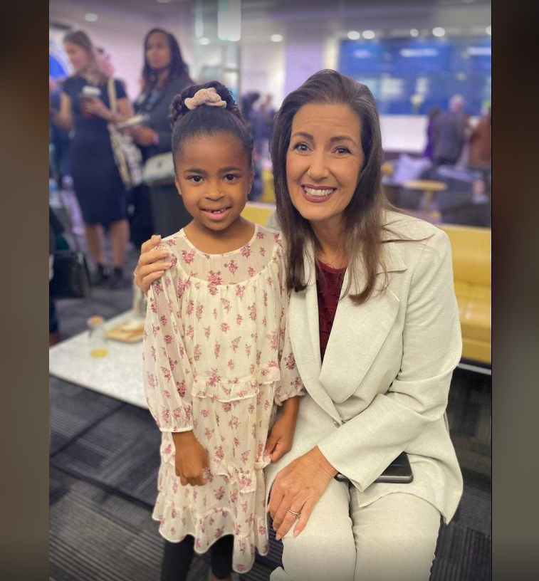 Stella Harrison, 7, with Oakland Mayor Libby Schaaf.