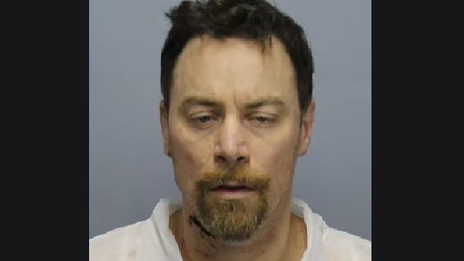 Hazel Park man who allegedly killed wife, slept next to her body for days pleads to lesser crime