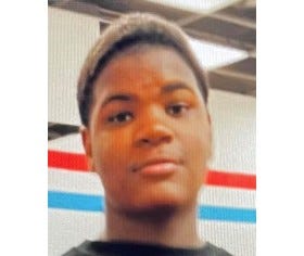 Young Black teen with short black hair 