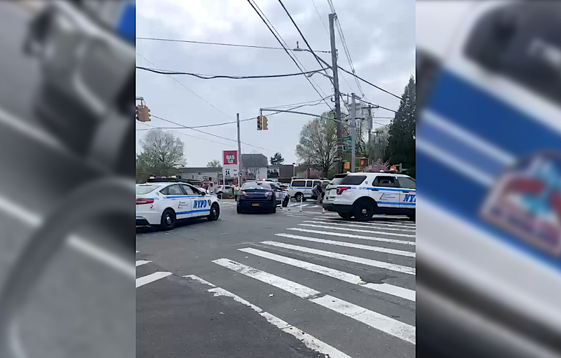 Police at the scene of the officer-involved shooting on April 16