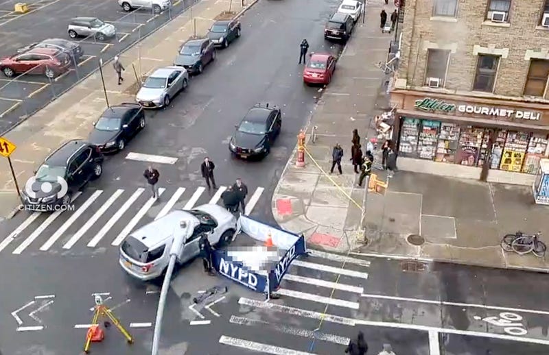 Police investigate at the fatal crash scene in Flatbush on the morning of March 8, 2024