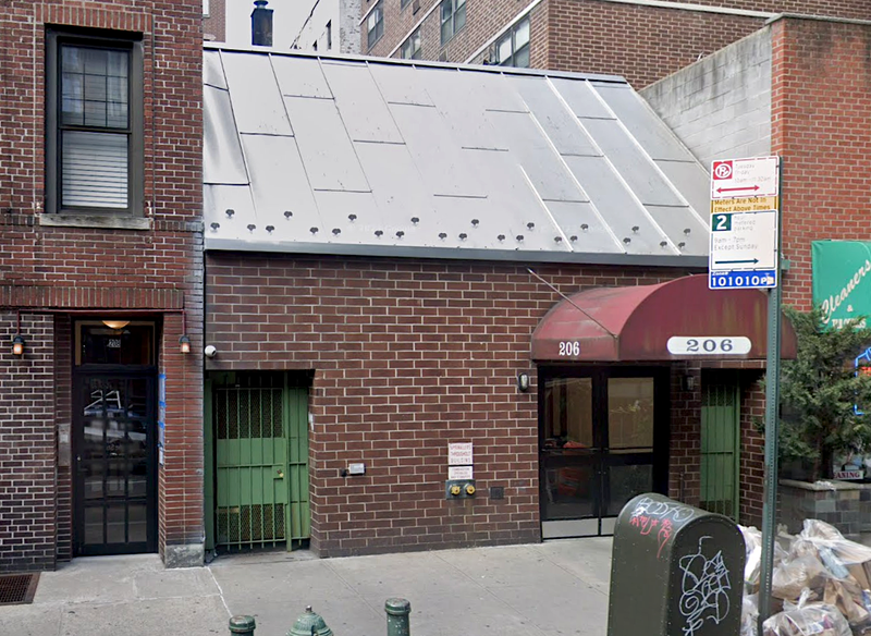 The squatters had been living at this address on West 31st Street following the death of the victim's mother months ago, police said