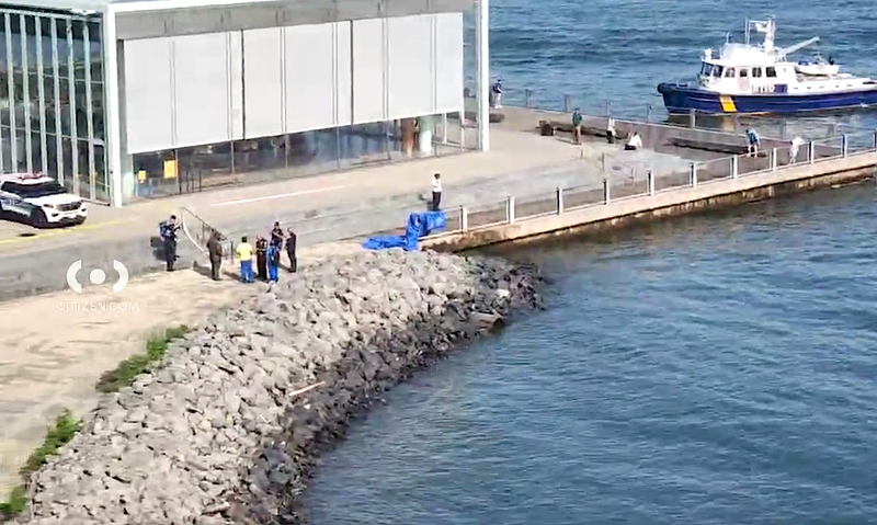 The NYPD was seen investigating at 55 Water St. after the remains were found around 9 a.m. Monday