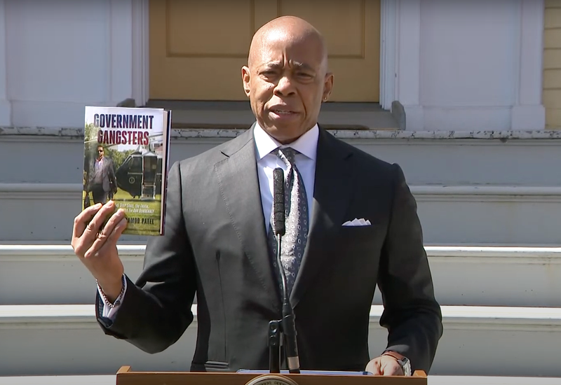 Adams held up a copy of FBI Director Kash Patel’s 2023 book “Government Gangsters" during an address to the city at Gracie Mansion on April 3, 2025
