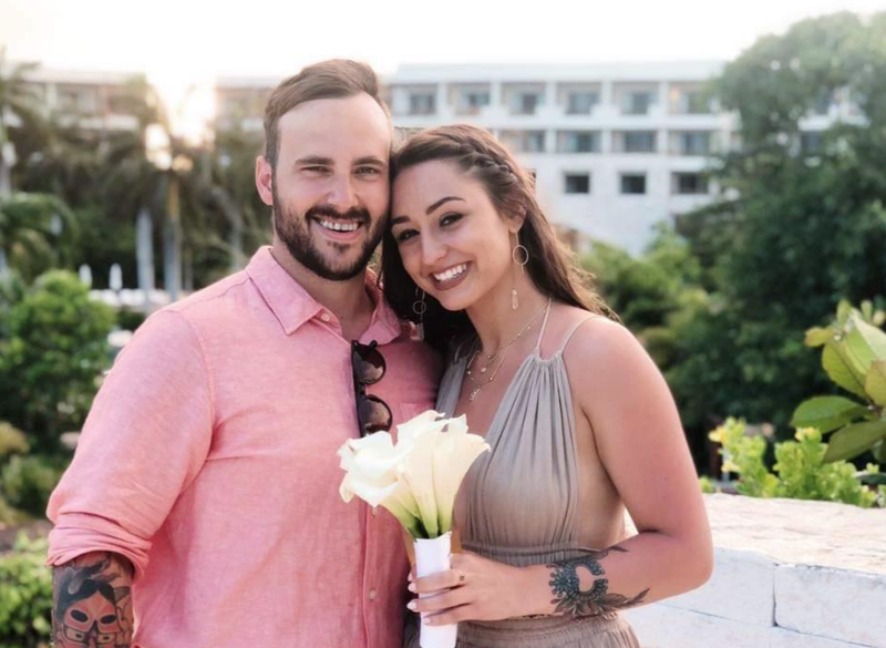 Officer Sean Sluganski with his fiancee'