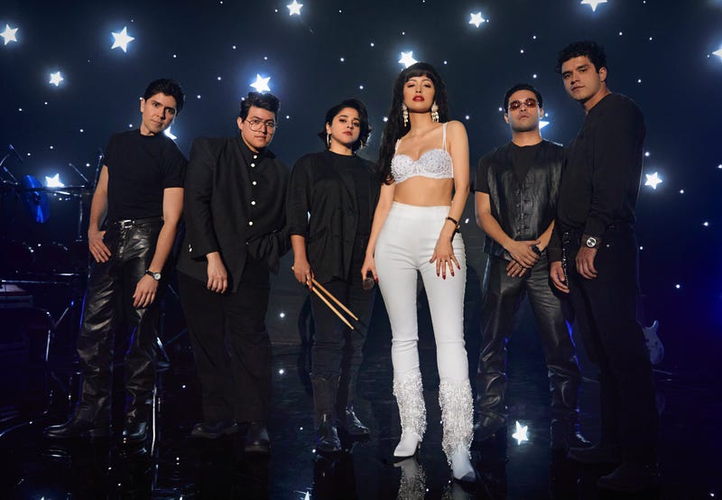 SELENA THE SERIES (L to R) CARLOS ALFREDO JR. as JOE OJEDAand HUNTER REESE PENA as RICKY VELA and NOEMI GONZALEZ as SUZETTE QUINTANILLA and CHRISTIAN SERRATOS as SELENA QUINTANILLA and GABRIEL CHAVARRIA as A.B QUINTANILLA and JESSE POSEY as CHRIS PEREZ in Trailer of SELENA THE SERIES