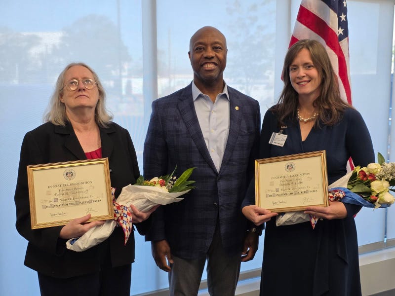 US Senator Tim Scott (R-SC) recognizes service of staff members Deb Blickenstaff and Danielle Gibbs October 31, 2025 in Greenville, SC.