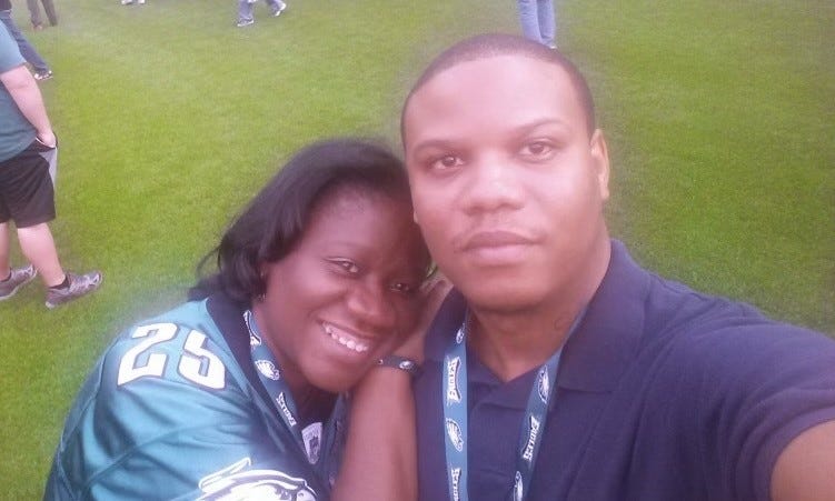 Shirley Dash and her son, Craig Wilmore, on Lincoln Financial Field.