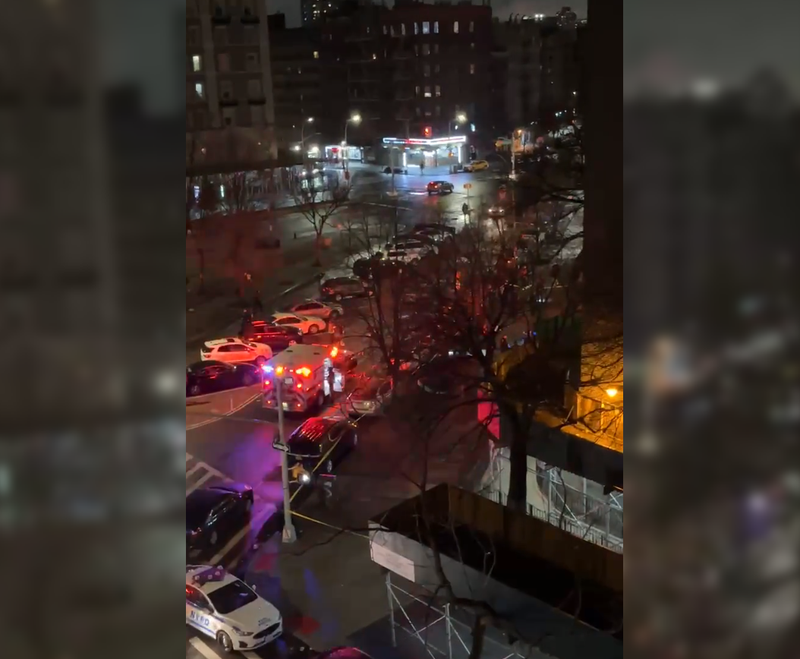 Emergency responders at the scene of Monday night's shooting in Harlem