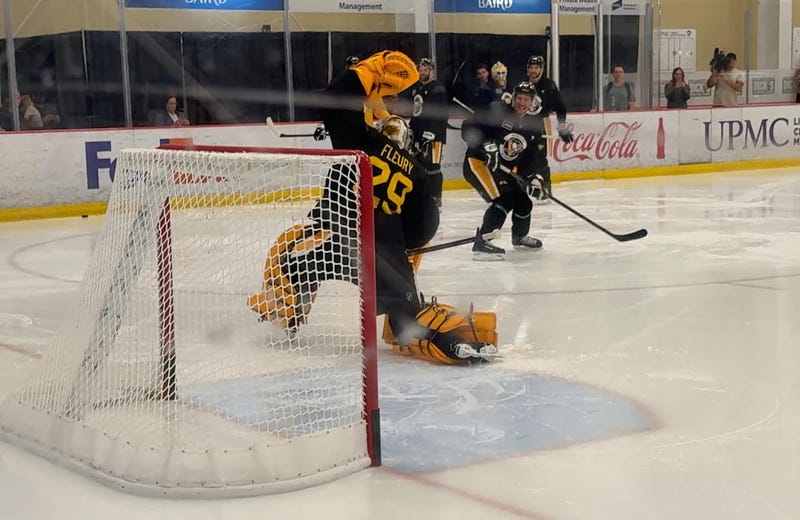 Sidney Crosby takes a shot on Marc-Andre Fleury