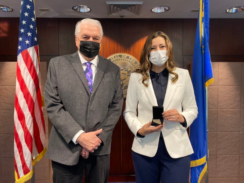 Nevada Governor Steve Sisolak poses with new Lt. Governor Lisa Cano Burkhead