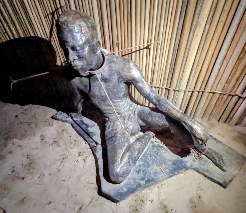 A statue of a slave at the Mobee Slave Relics Museum in Badagri, Nigeria.