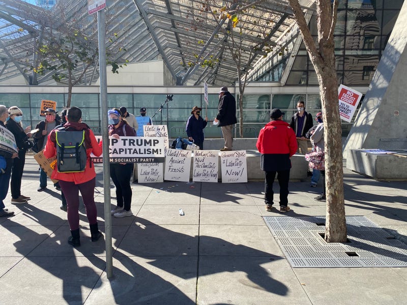 A small group of socialists gather in San Francisco to protest Wednesday's U.S. Capitol takeover.