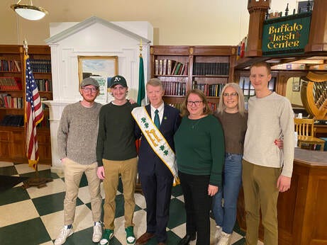 2023 Buffalo St Patrick's Day parade Grand Marshal Jim Wannemacher with his wife, sons and daughter-in-law.
