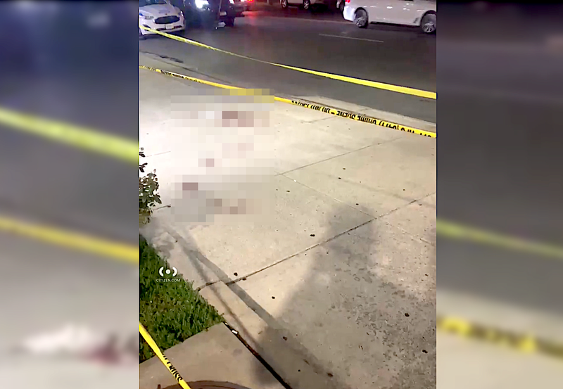A pool of blood was seen on a sidewalk near the gas station