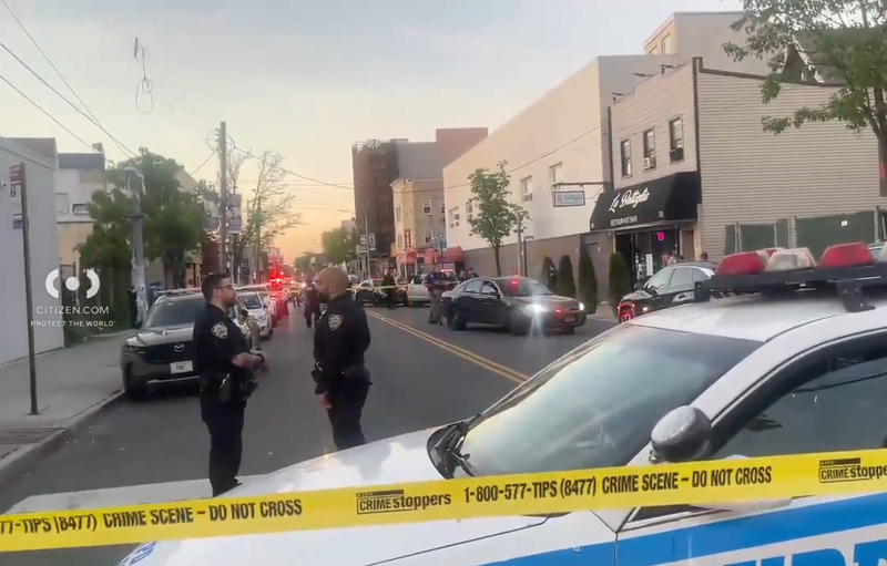 Three officers were injured by shattered glass when a suspect fired shots at an NYPD car on Staten Island Sunday night.